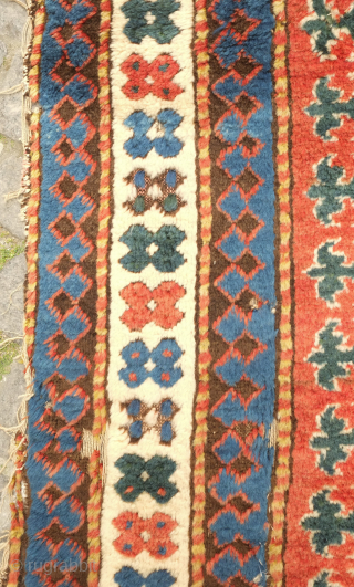 Karabagh rug, around 1850s, In Kazak-like design scheme. It has a meaty pile and a sparsely populated ground. A few spots here and there that need some repair along with the selvedges.  ...