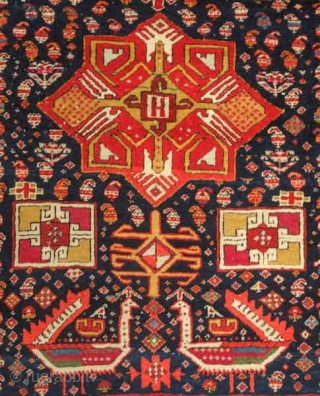 Akstafa long rug, 19th century.  Excellent colors generously applied.  The wool is extremely soft and velvet-like.  Two inward facing speckled camelids in the center.  I count around 9  ...