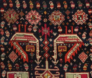 Akstafa long rug, 19th century.  Excellent colors generously applied.  The wool is extremely soft and velvet-like.  Two inward facing speckled camelids in the center.  I count around 9  ...