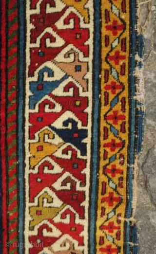 Akstafa long rug, 19th century.  Excellent colors generously applied.  The wool is extremely soft and velvet-like.  Two inward facing speckled camelids in the center.  I count around 9  ...