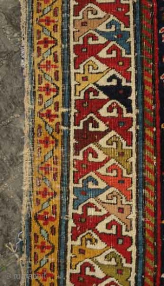 Akstafa long rug, 19th century.  Excellent colors generously applied.  The wool is extremely soft and velvet-like.  Two inward facing speckled camelids in the center.  I count around 9  ...