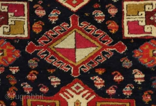 Akstafa long rug, 19th century.  Excellent colors generously applied.  The wool is extremely soft and velvet-like.  Two inward facing speckled camelids in the center.  I count around 9  ...