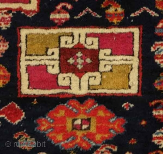 Akstafa long rug, 19th century.  Excellent colors generously applied.  The wool is extremely soft and velvet-like.  Two inward facing speckled camelids in the center.  I count around 9  ...