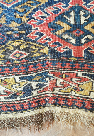 Shirvan Runner, 3rd to 4th Quarter of the 19th Century. Fantastic colors. Hooked medallion aligned in two columns. The rug has some worn spots and a section at the bottom that was  ...