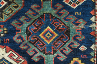 Shirvan Runner, 3rd to 4th Quarter of the 19th Century. Fantastic colors. Hooked medallion aligned in two columns. The rug has some worn spots and a section at the bottom that was  ...