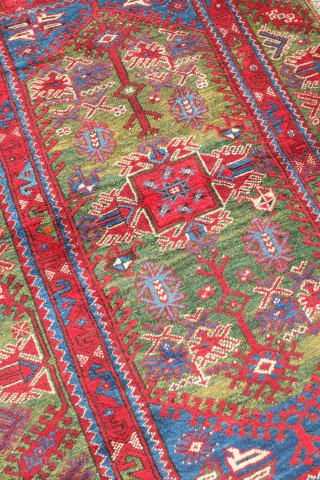 Dosemealti rug, 19th century.  This rug has an incredible rich green field and main border in lustrous wool.  Excellent pile with a slightly lower section in the top of the  ...