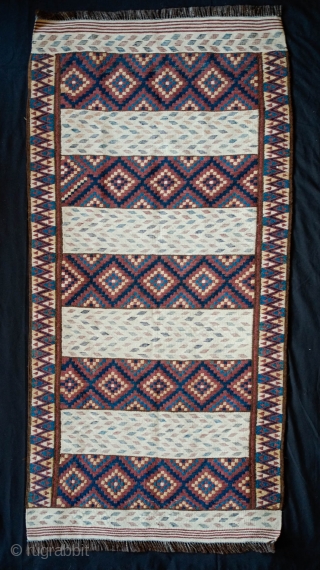 Tatari Kilim, Late 19th/Early 20th Century.  A very atypical weaving from this weaving group in Afghanistan.  Good natural dyes.  Goat hair warps.  A unique piece.  70 x  ...