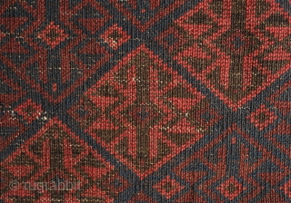 Khorassan Baluch rug, 4th quarter of the 19th century.  Saturated blues and rich brooding ember red.  Kilim ends in tact.  Linked hexagon border with "S" figures in the center  ...