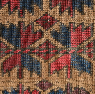 Khorasan Baluch rug, late 19th century.  Tree of life design over a camel wool ground.  Vivid purple in the leaves.  Some damage on one side of the selvedge.   ...