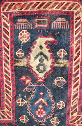 Shirvan Prayer Rug, 4th quarter of 19th Century.  Deep indigo blue ground and wonderful botehs in alternating directions.  The serrations around the botehs have the appearance of small "horns" on  ...