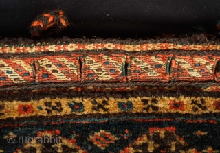 Qashqa'i Chanteh, 19th century.  Deep green-blue ground.  Vivid striped back.  Well executed soumak work on the top.  All good colors.  Selvedge missing and there is a small  ...