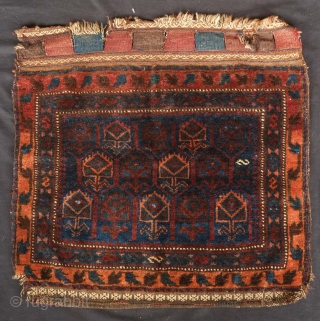 Baluch khorjin, 19th century.  Timuri Baluch from Western Afghanistan.  Good colors and soft wool with the wonderful back intact.  63 x 61 cm       