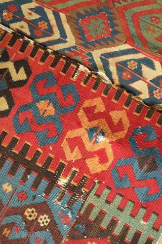 Kagizman kilim fragment. Probably first half of the 19th century.  Excellent colors, saturation and drawing. The deep apricot indicates excellent age.  Handspun cotton warps.  95 x 186 cm  