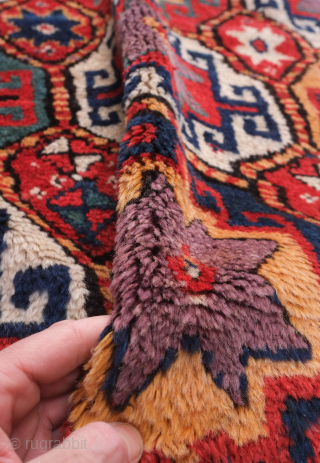 Quchan Kurdish rug, late 19th century.  Extraordinary colors and condition.  The pile is full.  Colors include an exceptional purple, green and apricot. A real gem. 158 x 358 cm  ...