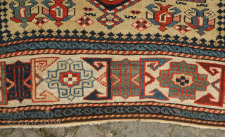 Kuba prayer rug, dated to 1884 according to the mixed Arabic and Western numbers in the inscribed date. Yellowish ground.  Kufic borders. Double headed birds and animals in the field.   ...