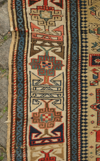 Kuba prayer rug, dated to 1884 according to the mixed Arabic and Western numbers in the inscribed date. Yellowish ground.  Kufic borders. Double headed birds and animals in the field.   ...