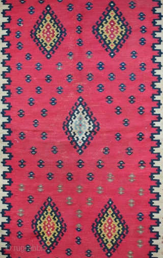 Sarkoy/Pirot Kilim, Late 19th Century to 1900 or so.  Beautiful poised composition like a ripple in a lake from the central medallion.  All good colors.  105 x 156 cm 