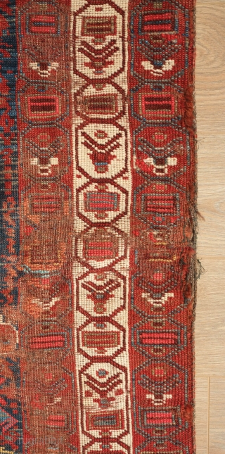 Khamseh rug, 3rd to 4th quarter of the 19th century.  A wonderful array of mounted tribesmen in the field amidst unique half abstract winged medallions.  The field is filled with  ...