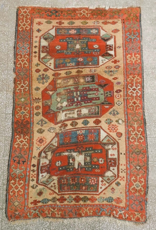 Arapgir Kurdish rug, mid-19th century or so.  Camel wool ground.  Excellent age. Simple border.  The lobbed medallions are each unique from one another.  117 x 190 cm  