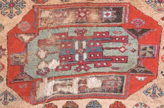 Arapgir Kurdish rug, mid-19th century or so.  Camel wool ground.  Excellent age. Simple border.  The lobbed medallions are each unique from one another.  117 x 190 cm  