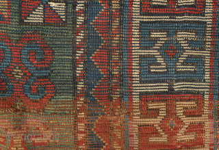 Fachralo green ground rug, 19th century. Wonderful field of green, kochanak border and elibelinde motifs on both ends of the field.  Obvious wear but all there. 142 x 234 cm  