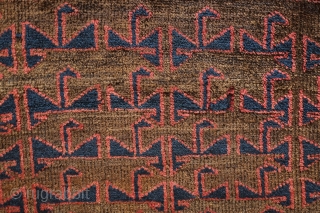 Baluch saddle bag face, 4th quarter of 19th century.  Probably from the Farah area of W. Afghanistan.  This has very soft wool and a bit of fuchsin in the border.  ...