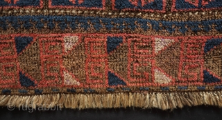 Baluch saddle bag face, 4th quarter of 19th century.  Probably from the Farah area of W. Afghanistan.  This has very soft wool and a bit of fuchsin in the border.  ...