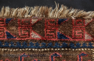 Baluch saddle bag face, 4th quarter of 19th century.  Probably from the Farah area of W. Afghanistan.  This has very soft wool and a bit of fuchsin in the border.  ...