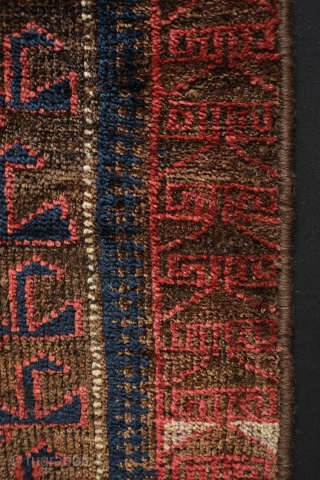 Baluch saddle bag face, 4th quarter of 19th century.  Probably from the Farah area of W. Afghanistan.  This has very soft wool and a bit of fuchsin in the border.  ...