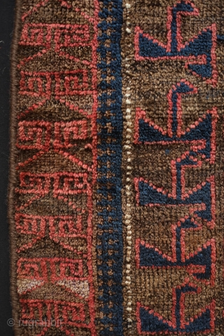 Baluch saddle bag face, 4th quarter of 19th century.  Probably from the Farah area of W. Afghanistan.  This has very soft wool and a bit of fuchsin in the border.  ...