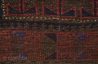 Baluch saddle bag face, 4th quarter of 19th century.  Probably from the Farah area of W. Afghanistan.  This has very soft wool and a bit of fuchsin in the border.  ...