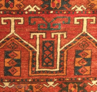 Ersari jollar, late 19th century.  Good colors with an apricot and a deep green.  Motifs resembling portals or grave stones topped with ram's horns for protection.  One small spot  ...