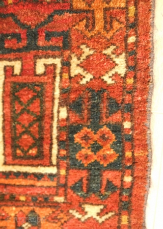 Ersari jollar, late 19th century.  Good colors with an apricot and a deep green.  Motifs resembling portals or grave stones topped with ram's horns for protection.  One small spot  ...