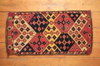 Uzbek Ikat patterned pile face, Late 19th century.  Good, strong natural colors and attractive ikat design.  Touches of petrol-like green all along the border.  Well done repairs on each  ...
