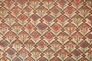 Shirvan prayer rug, 19th century. Good colors and "V" orientation of the floral lattice motifs. Outer-most border is missing. Selvedge is intact. 100 x 137 cm
       