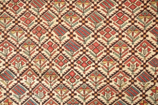 Shirvan prayer rug, 19th century. Good colors and "V" orientation of the floral lattice motifs. Outer-most border is missing. Selvedge is intact. 100 x 137 cm
       