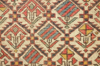 Shirvan prayer rug, 19th century. Good colors and "V" orientation of the floral lattice motifs. Outer-most border is missing. Selvedge is intact. 100 x 137 cm
       