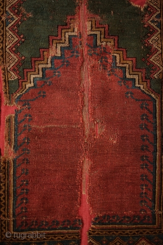 Mudjur prayer rug, late 18th or early 19th century.  Wonderful green above the mihrab.  Small crosses appear in the diamonds in the inner border. Already professionally mounted on linen. 114  ...