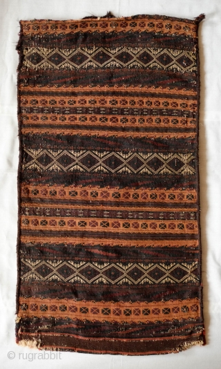 Chakansur Baluch Grain Bag, Late 19th Century.  Beautiful apricot hue on the front and rich red and purple on the back in a very fine weave.  It has a bit  ...