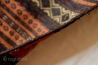 Chakansur Baluch Grain Bag, Late 19th Century.  Beautiful apricot hue on the front and rich red and purple on the back in a very fine weave.  It has a bit  ...