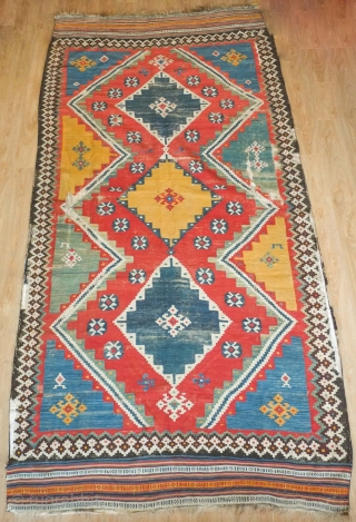 Qashqa'i kilim, probably mid-19th century.  Excellent colors.  Some wear but complete. Mounted on cotton backing.  162 x 313 cm. Happy New Year!  Contact danauger@tribalgardenrugs.com     