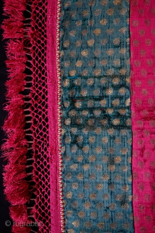 Gujarat Silk Hanging or Bohcha, Mid-19th Century.  Wonderful cochineal and a beautiful deep green with gold thread woven in to create the repeat boteh designs.  The tassels are a wonderful  ...