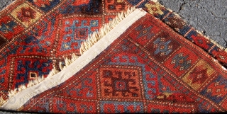 Kurdish Jaff bag face or front, nineteenth century, all dyes appear natural including strongly saturated red, ends slightly reduced.  30" by 21".  Please ask for additional photos if needed.  