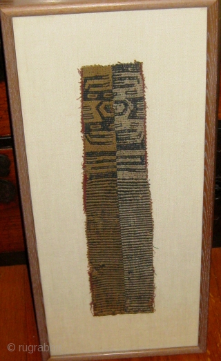 Pre-Columbian textile fragment, framed, probably Chancay, 11" by 25" in its frame, 4" by 17" textile alone.  Please ask for additional photos if needed.        