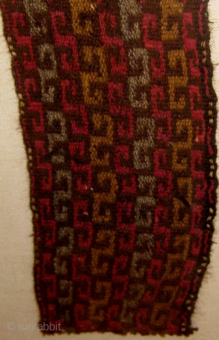 Framed Pre-Columbian (Chancay) textile fragment, either belt or headband, with 3 repeating patterns in succession, 11" by 27" frame size, 3" by 20" fragment size.  Please ask for additional photos  