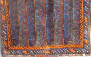 Very unusual antique Baluch bag front, last quarter of the 19th century, with an unusual array of deeply saturated natural colors including various shades of blue, green, aubergine, deep apricot, etc.   ...