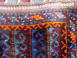 Very unusual antique Baluch bag front, last quarter of the 19th century, with an unusual array of deeply saturated natural colors including various shades of blue, green, aubergine, deep apricot, etc.   ...