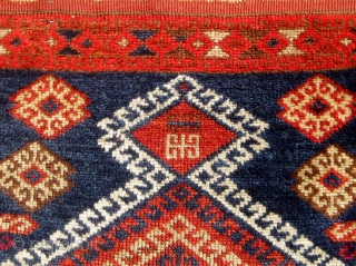 Antique Anatolian Kurdish yastik, from the Malatya area. Last quarter of the 19th Century.  All dyes appear natural with the possible exception of the highly saturated red in the outer border--difficult  ...