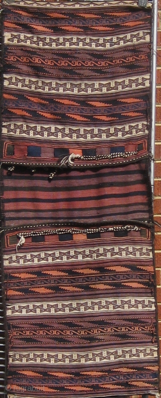 Complete Baluch khorjin in beautiful condition, fine weave, floppy handle, and wonderful design, first quarter of the 20th century, all dyes natural except for the pale rosy orange which faded from a  ...