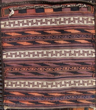 Complete Baluch khorjin in beautiful condition, fine weave, floppy handle, and wonderful design, first quarter of the 20th century, all dyes natural except for the pale rosy orange which faded from a  ...